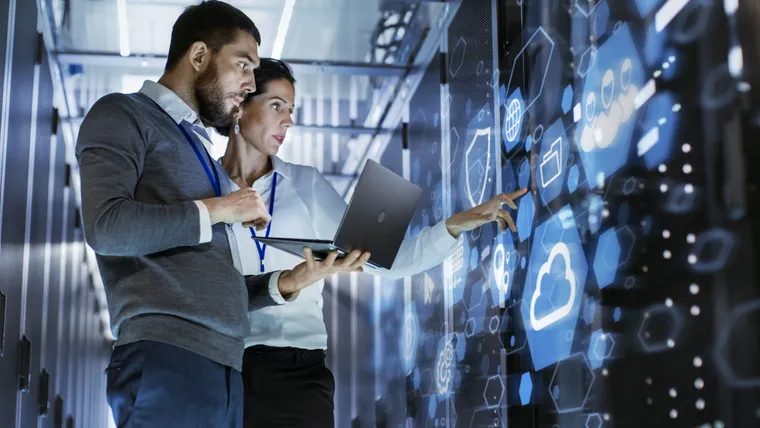 Managed IT specialists reviewing data center systems