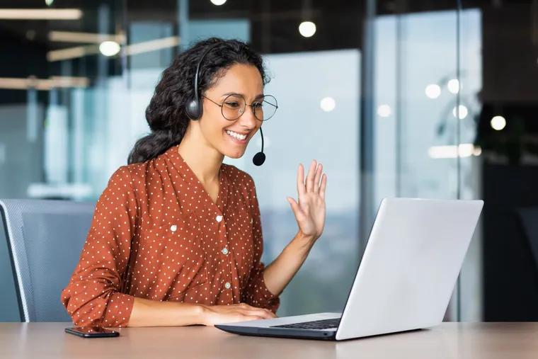 Remote support specialist helping a customer by video call