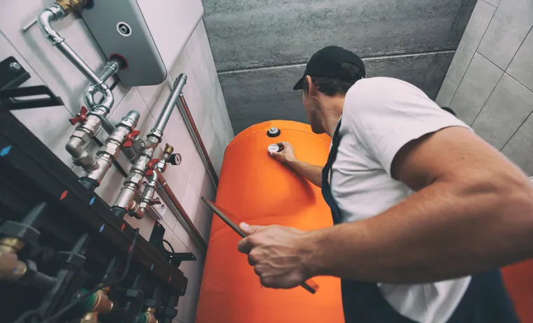 Service technician inspecting a building's mechanical system