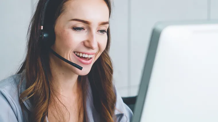 Customer service professional using a headset for business calls